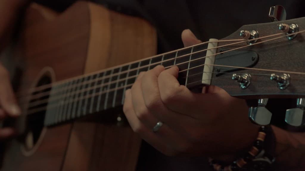 Joshua Williams playing guitar
